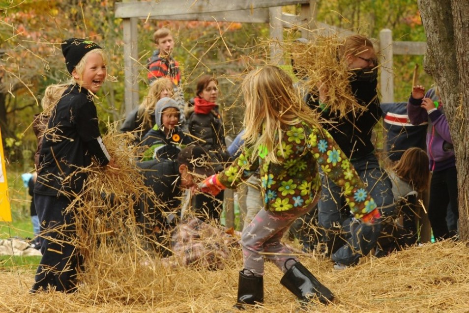 kids playing in hay fall
